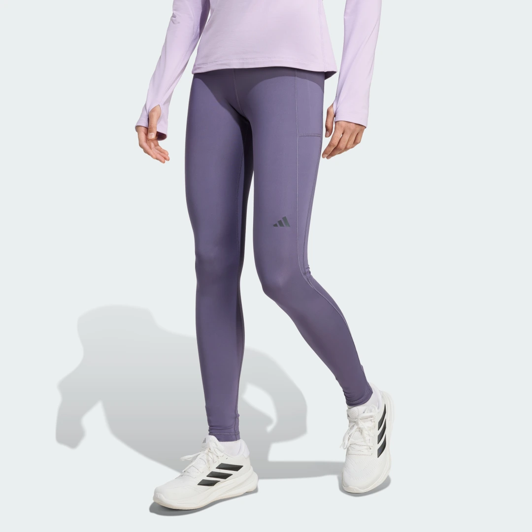 Detalle de Mallas largas Own the Run de Adidas en violeta