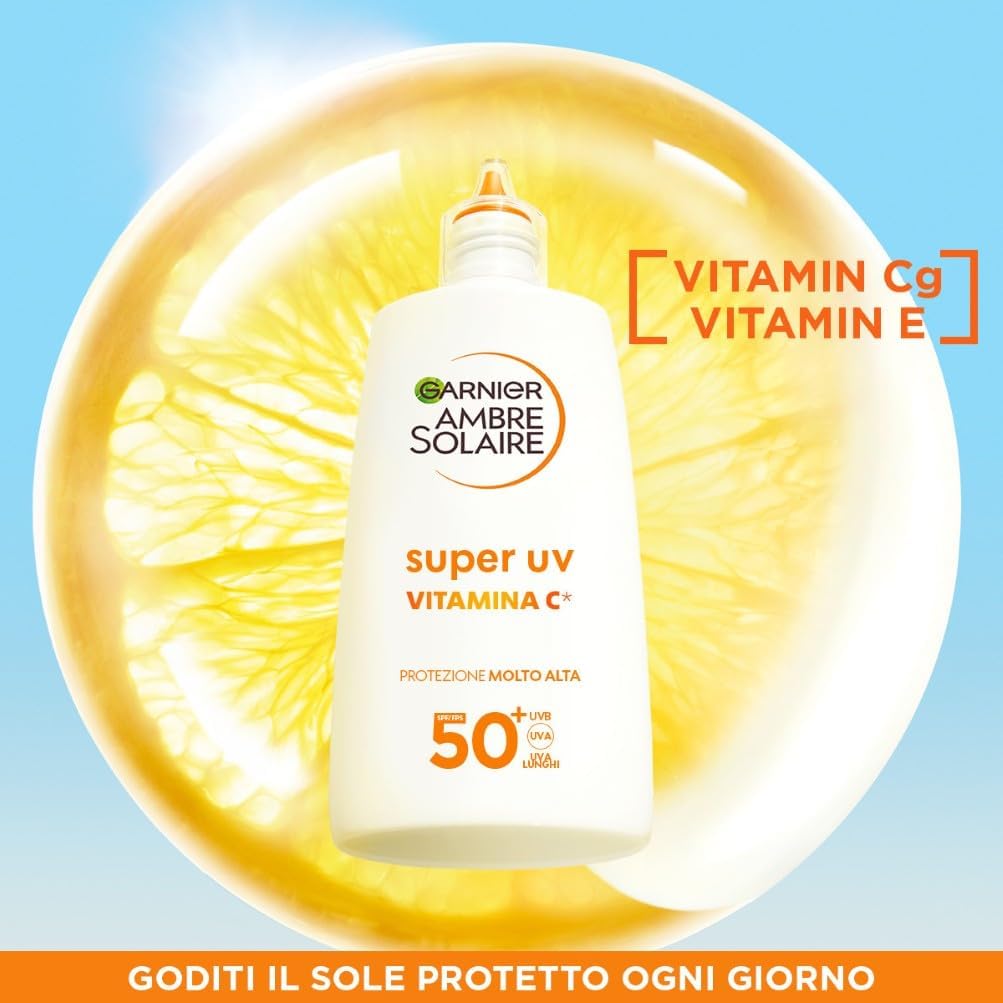 Detalle de Garnier Ambre Solaire Super UV Fluido Viso Anti Macchie SPF 50+ con vitamina Cg, effetto invisibile