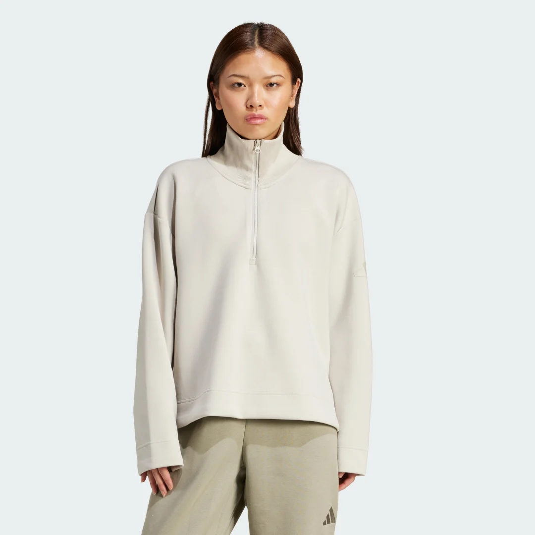 Detalle de Sudadera con cremallera hasta el pecho Soft Lux de Adidas – Beige