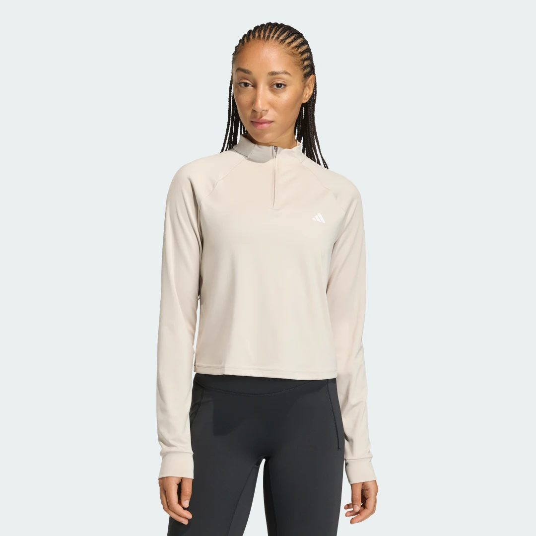 Detalle de Sudadera Train Essentials Minimal Branding 1/4 Zip de Adidas — beige