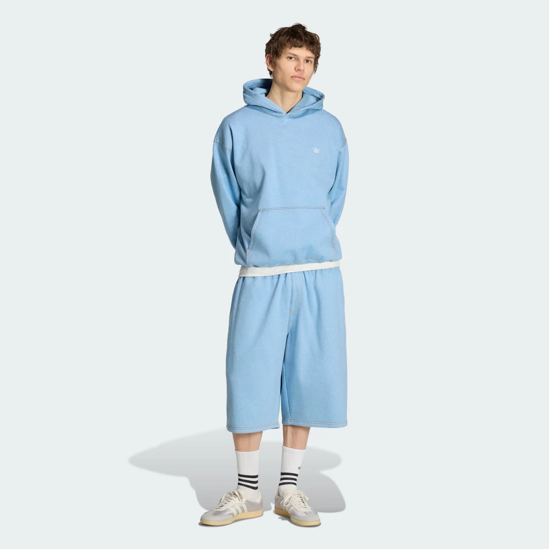 Detalle de Sudadera con capucha Trefoil Essentials jaspeada de corte holgado – Adidas