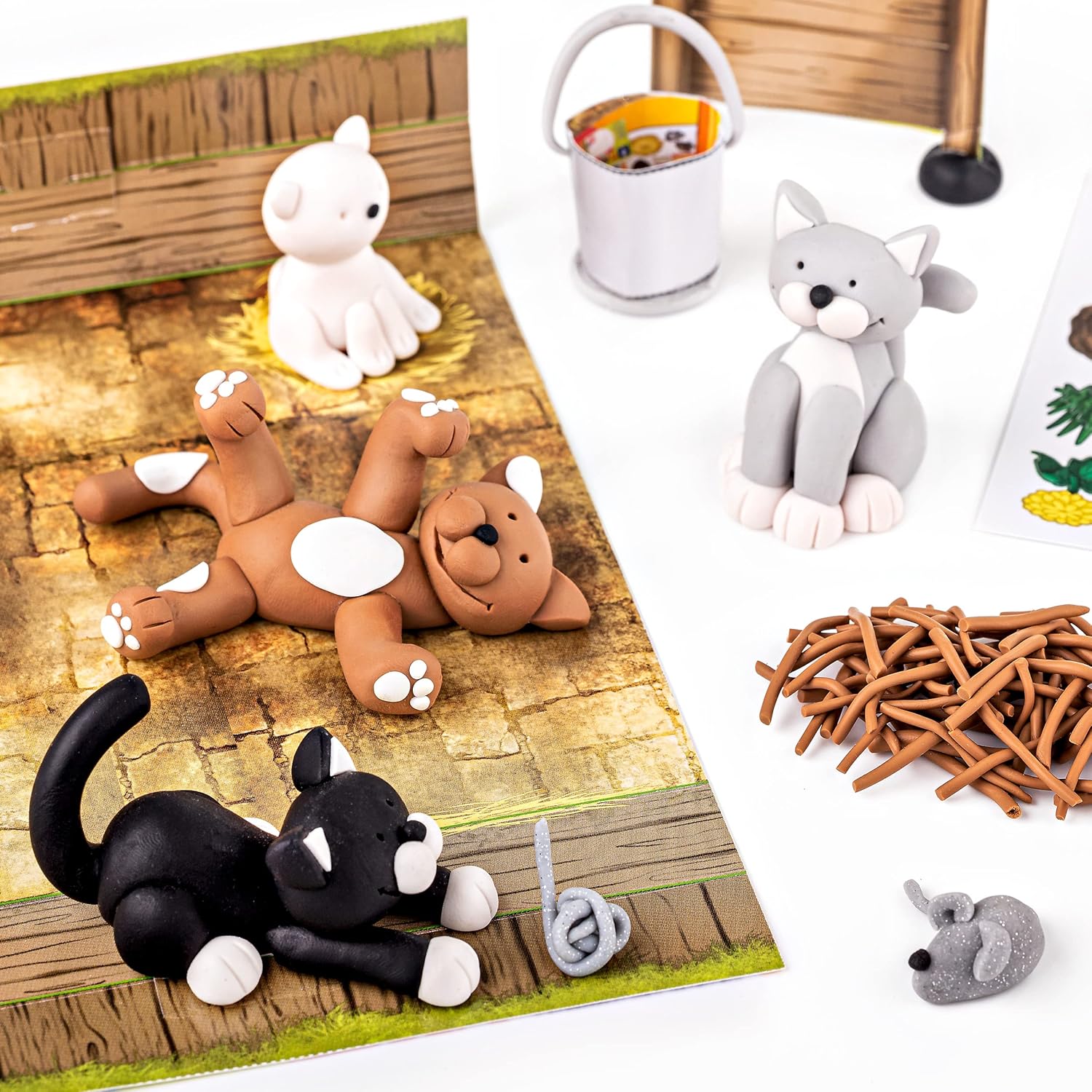 Detalle de STAEDTLER 8034 16 LZ FIMO Kids Form&Play – Jeu de pâte polymère pour enfants (lot de 4 blocs, autocollants, outils, arrière-plan)