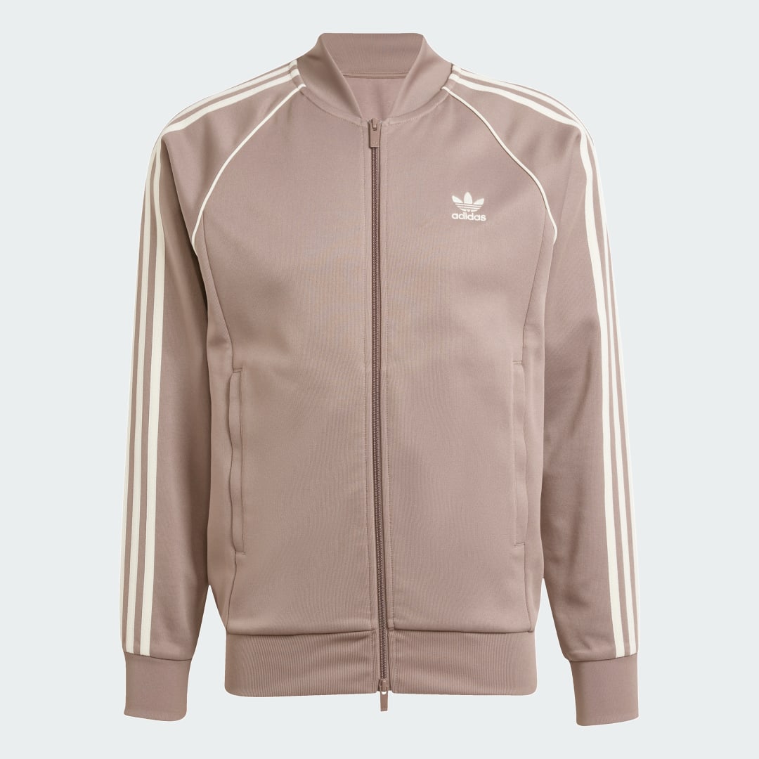 Detalle de Chaqueta SST Adicolor Classics de Adidas — marrón, estilo urbano con enfoque práctico
