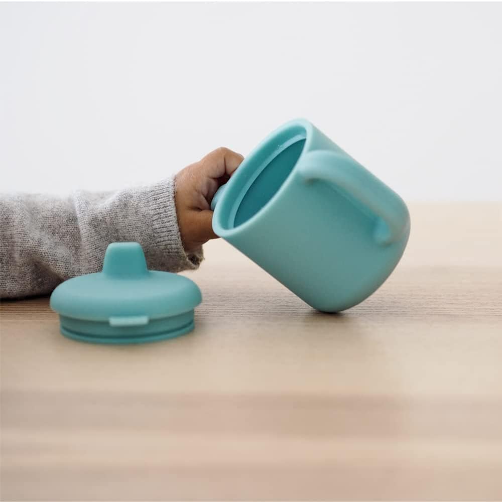 Detalle de BÉABA 2 in 1 Tazza/Biberon da Allenamento in vetro con maniglie rimovibili – 210 ml, Blu Vento