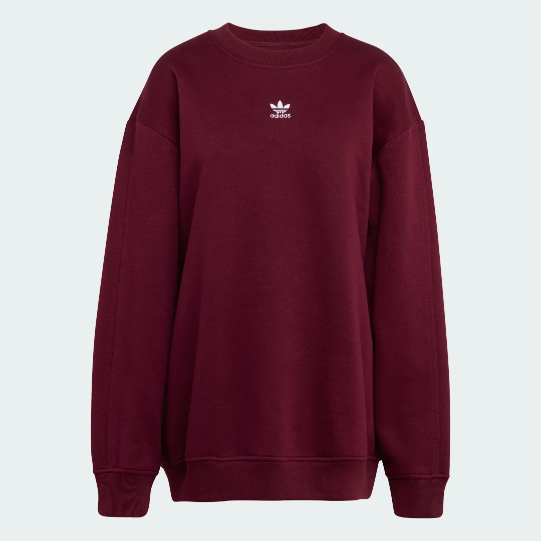 Detalle 2 de Sudadera larga holgada Essentials de Adidas: felpa, cuello redondo y tono Burgundy