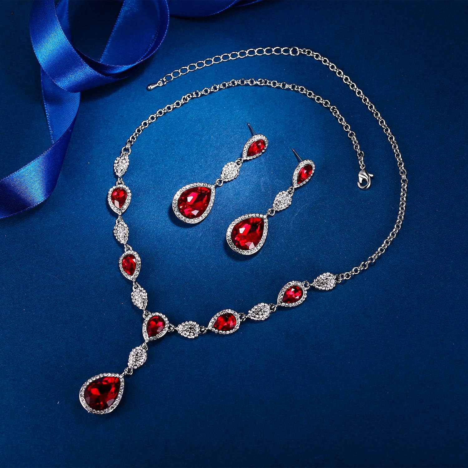 Detalle de Clearine Parure de bijoux femme : collier, boucles d’oreilles et bracelet en cristal transparent argenté