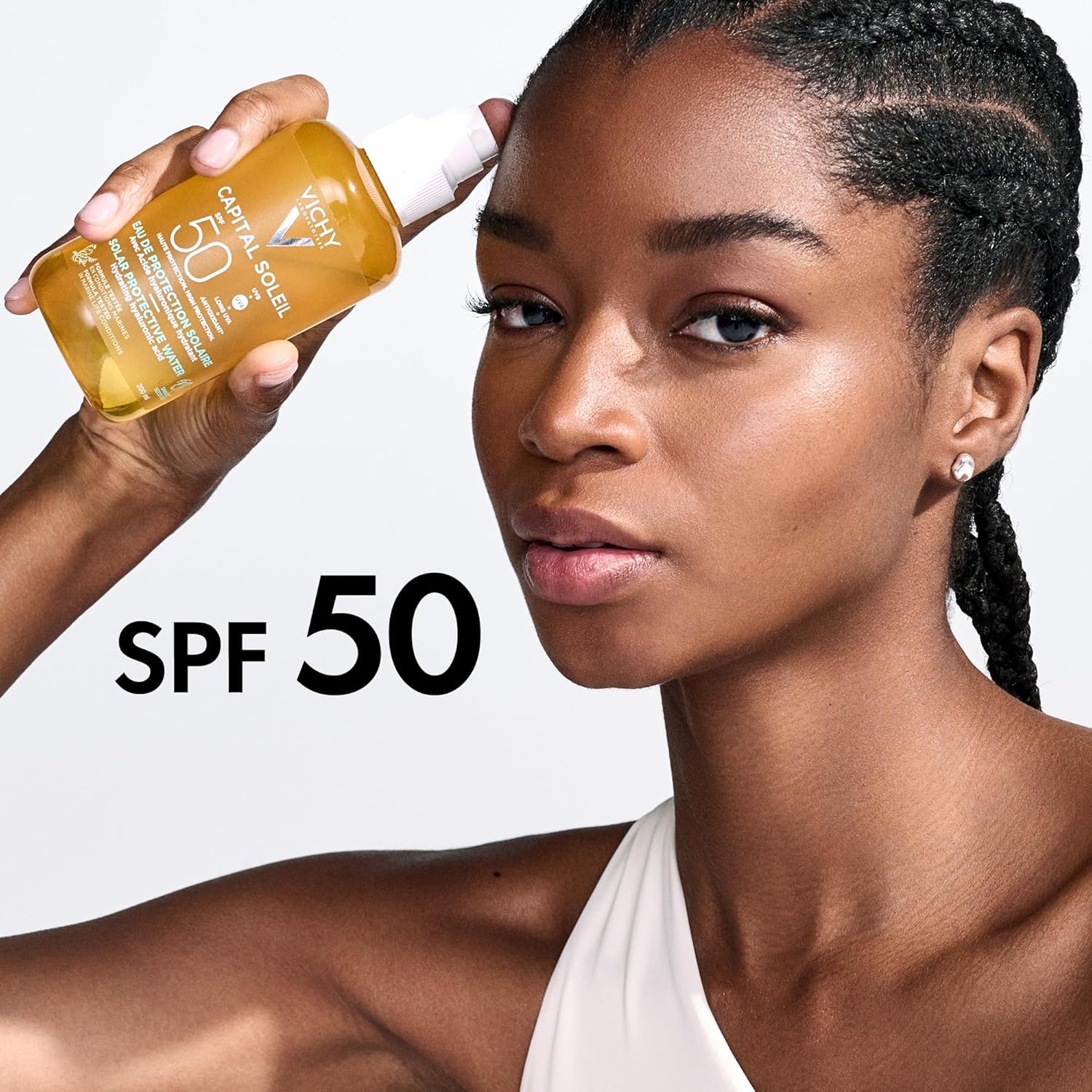 Detalle de Vichy Capitail Soleil Eau de Protection Solaire SPF 50 – Spray bi-phasé activateur de bronzage