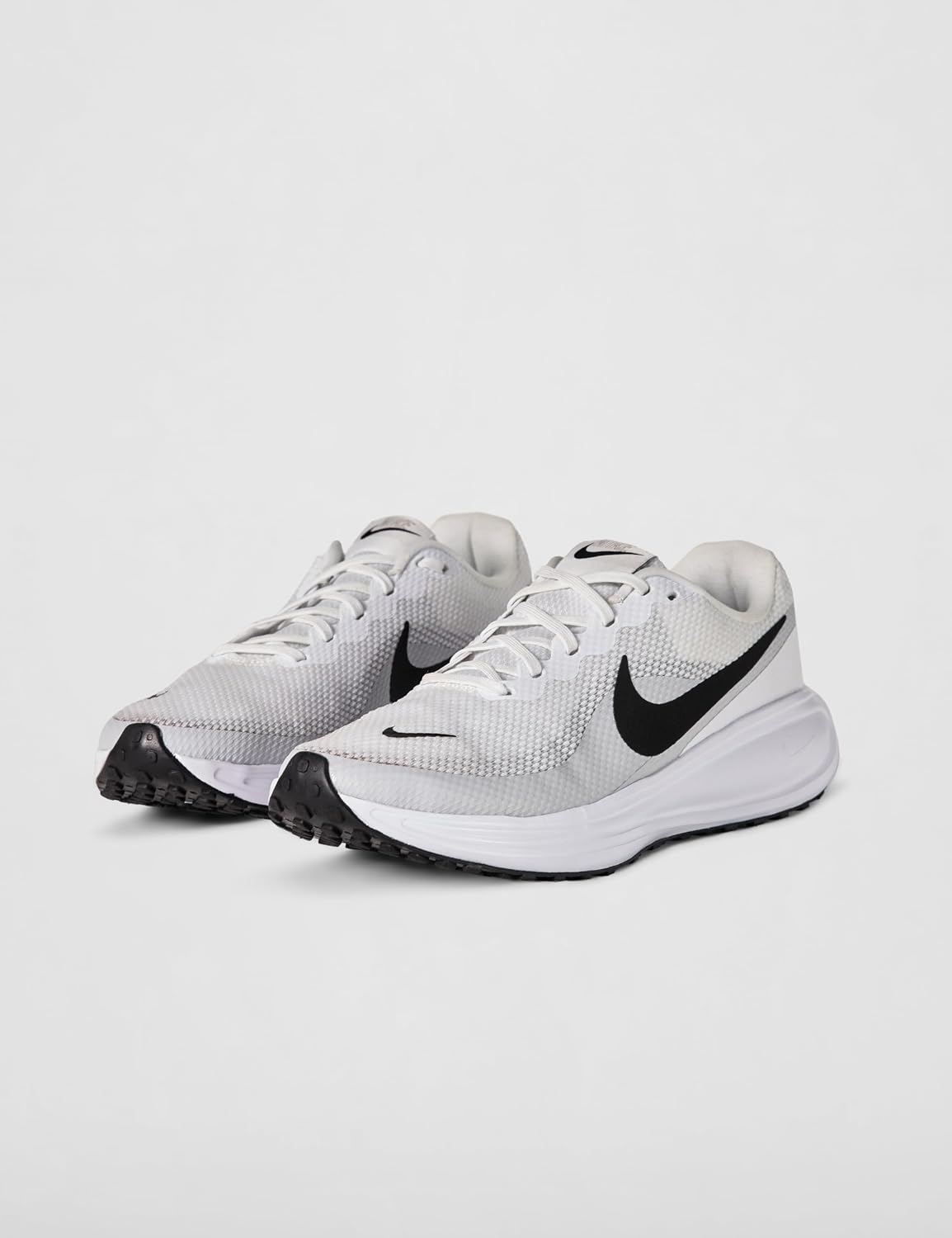 Detalle de Nike Men's Revolution 8 Sneaker: leggerezza, comfort e versatile everyday wear