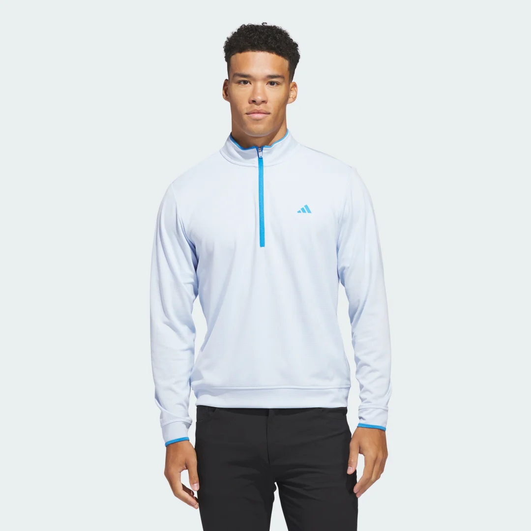 Detalle de Sudadera ligera con cremallera hasta el pecho de Adidas en azul