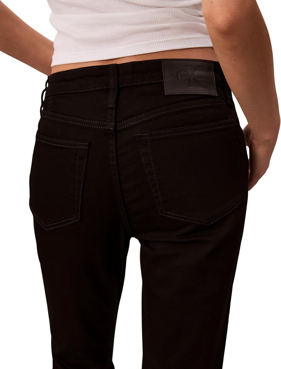 Detalle de Calvin Klein women’s mid rise skinny classic black jeans (5-pocket)