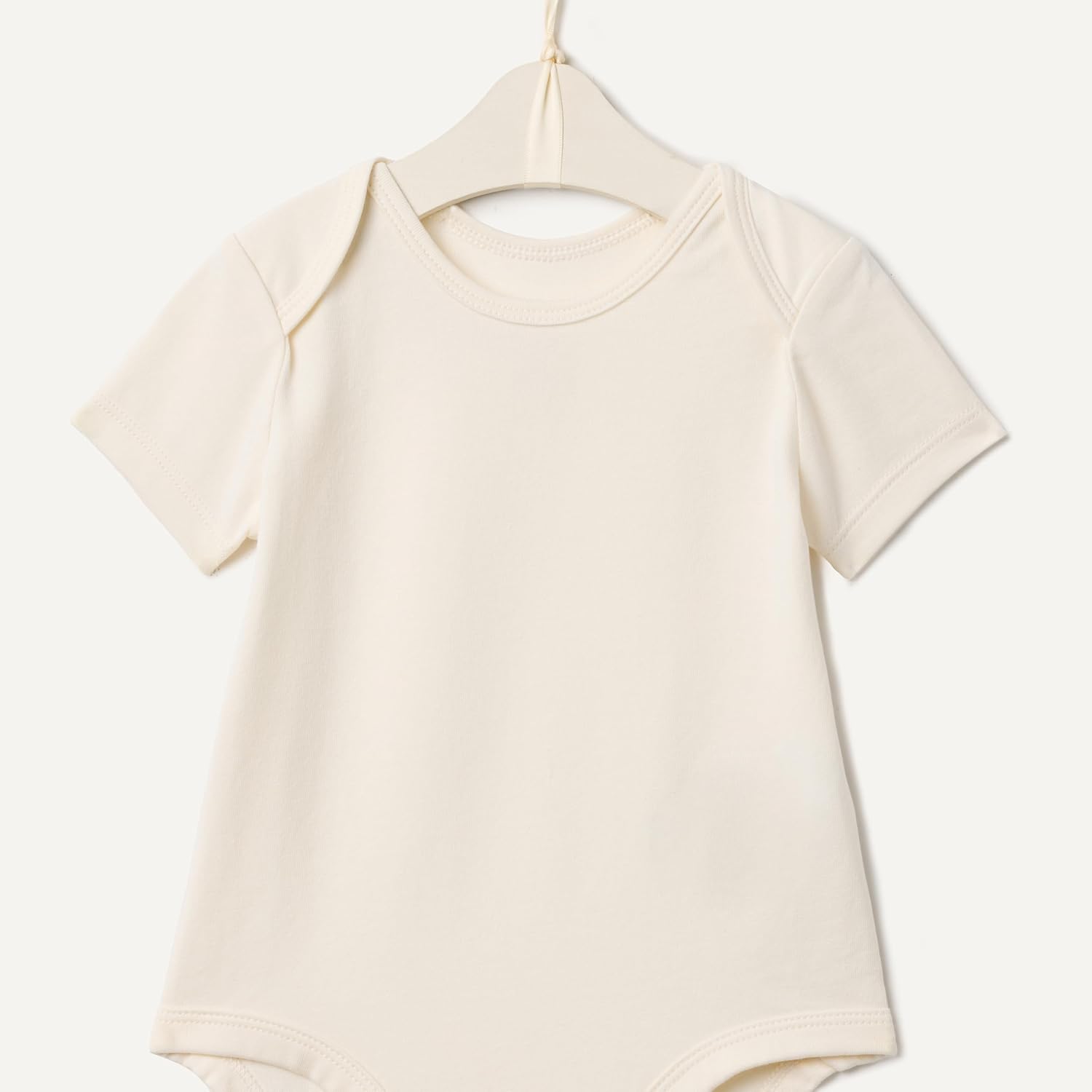 Detalle de Amazon Essentials x Sofia Grainge Unisex Babies' Short Sleeve Crewneck Bodysuit