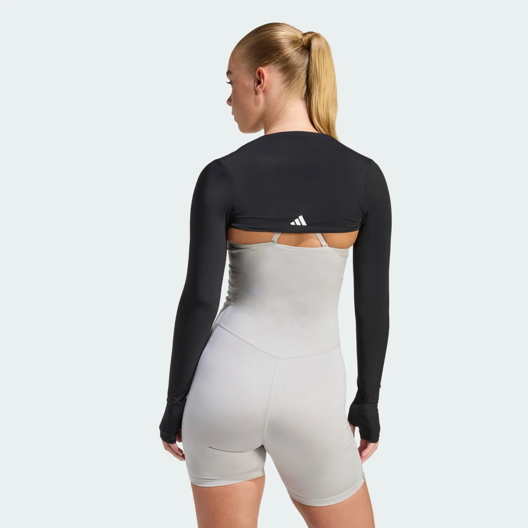 Detalle 2 de Adidas PrimeLift Essentials, bolero de entrenamiento negro con efecto moldeador