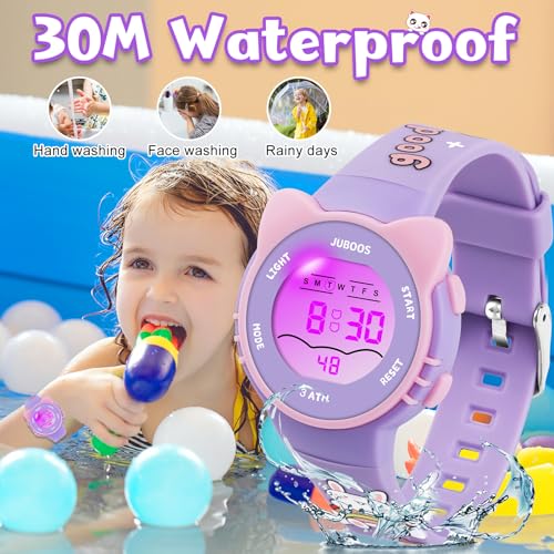 Detalle de Juboos Montre Enfant avec Bracelet Imprimé et 7 Lumières Colorées – Étanche, LED et Oreilles de Chat