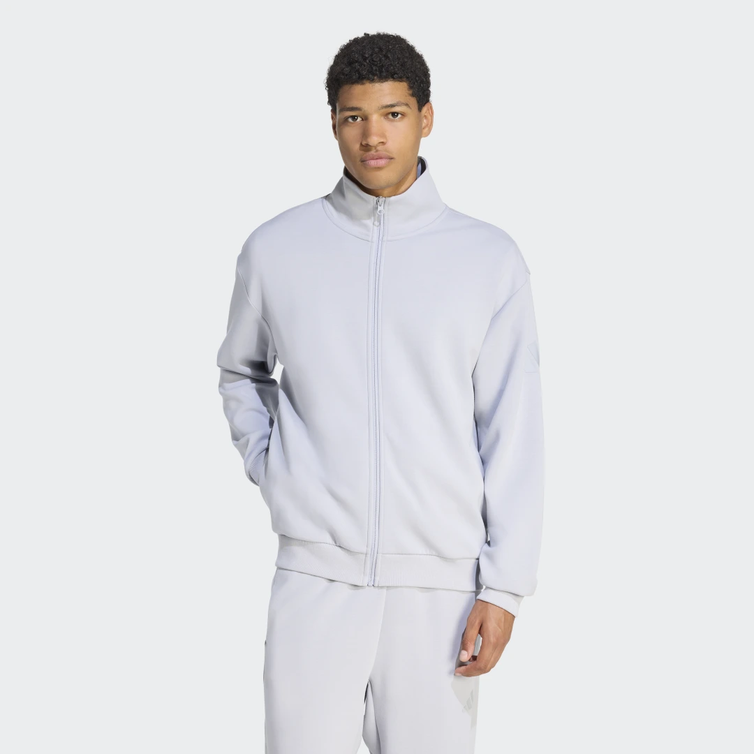 Detalle de Adidas Soft Lux, chaqueta deportiva gris