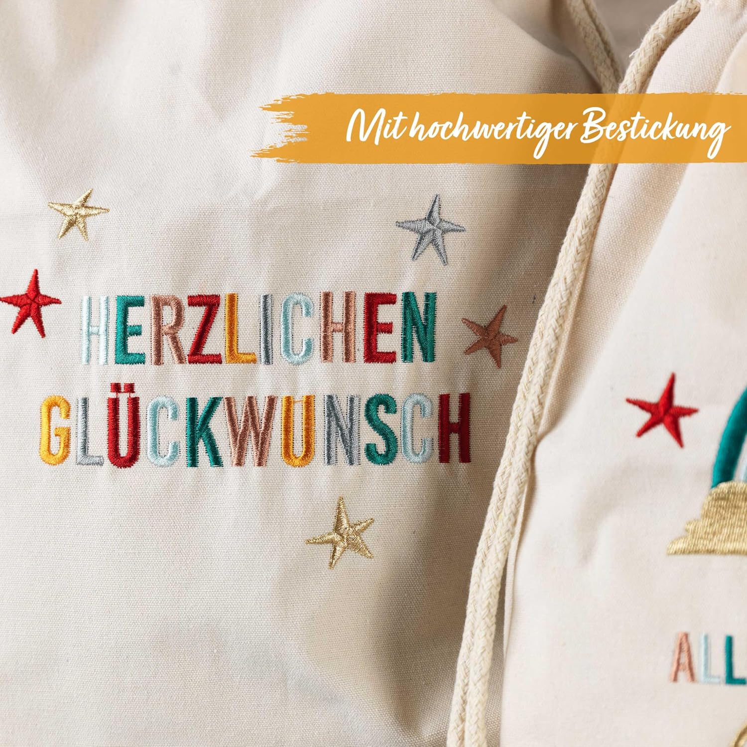 Detalle 2 de Papierdrachen Papierdrachen 2 Geschenksäckchen zum Geburtstag – Regenbogen aus Baumwolle, bestickt, mit Zugband