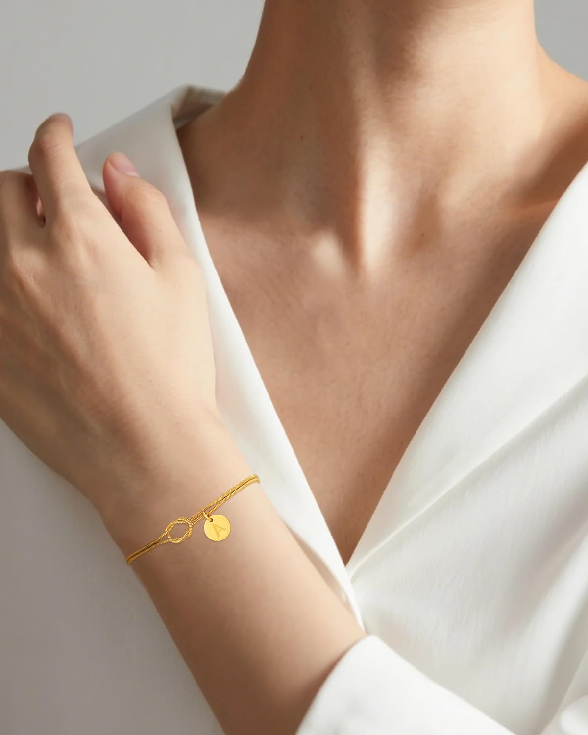 Thumbnail 2 de TOLOWOBK gold initial bracelet with infinity love knot design (18K gold plated 316L stainless steel)