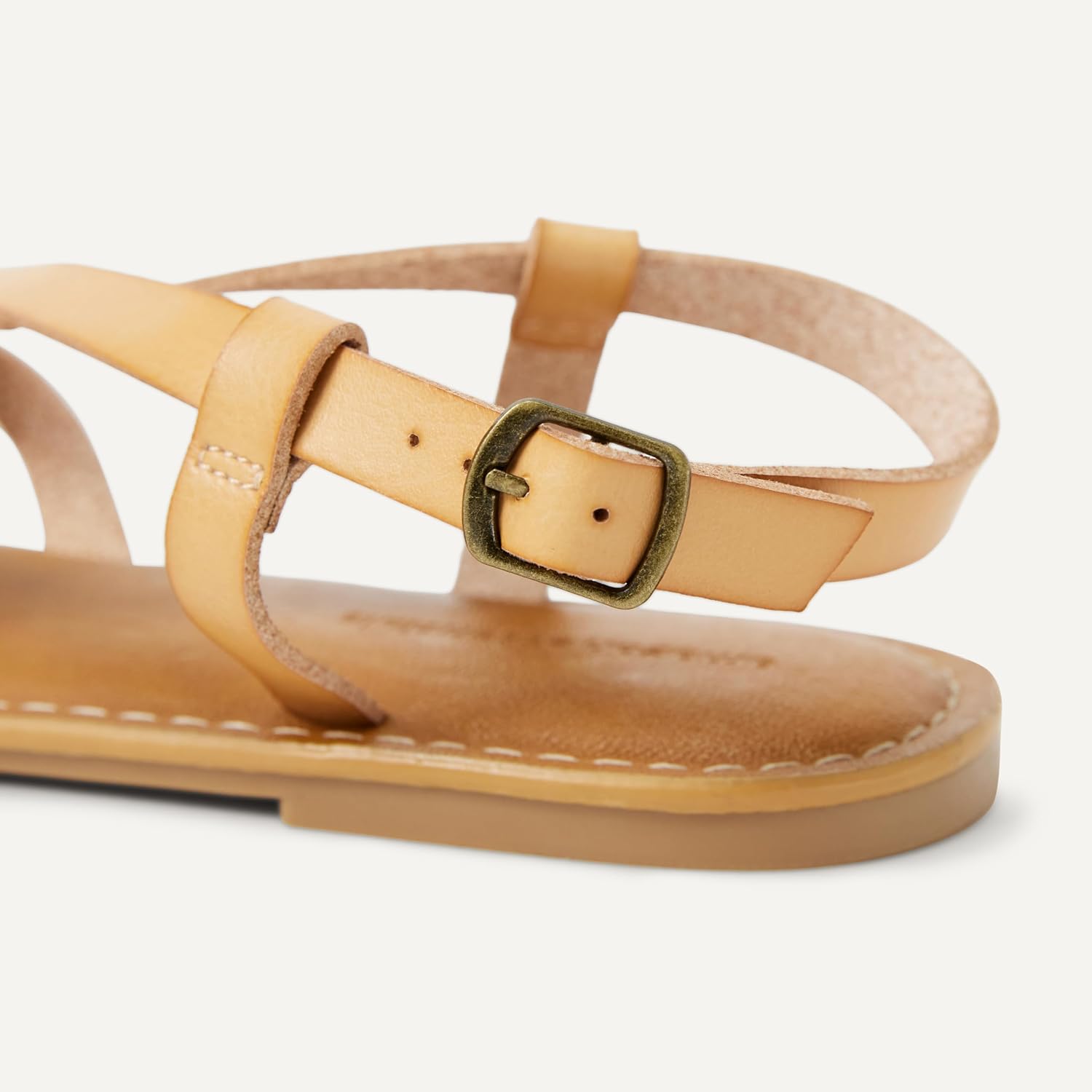 Detalle de Amazon Essentials Damen-Freizeitsandale mit Riemchen – Zehenstegsandale mit verstellbarem Knöchelriemen
