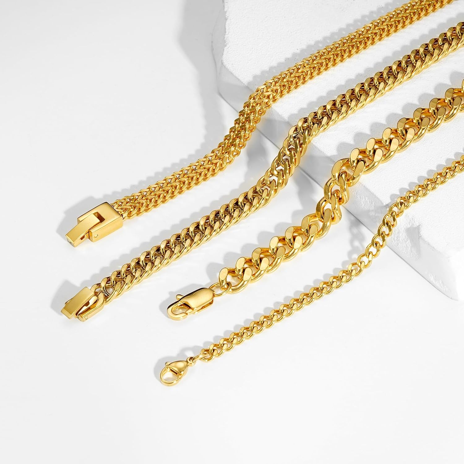 Detalle de Esmoly set 4 bracciali da uomo in acciaio 316L argento/oro/nero, maglia cubana – lunghezze 19/21/23 cm