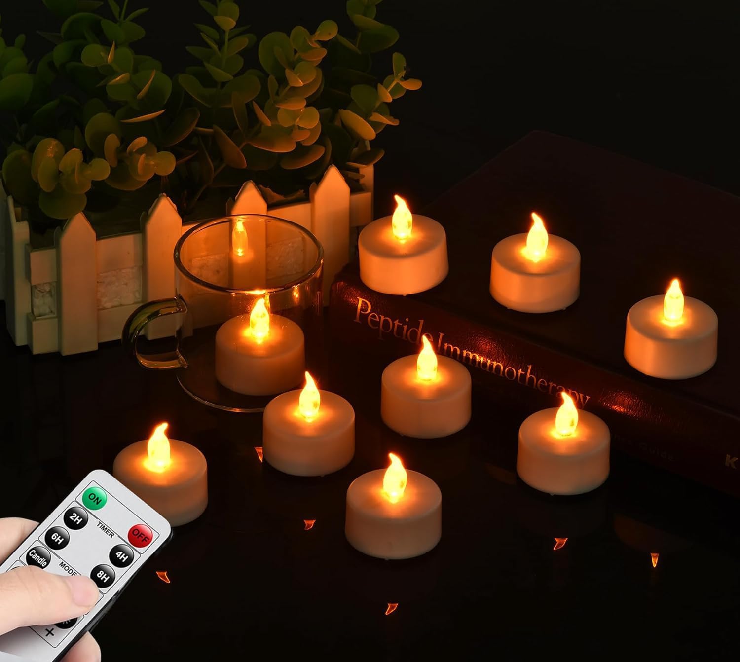 Detalle de Nancia LED Teelichter mit Fernbedienung und Timer (Warmgelb, 24er-Set)