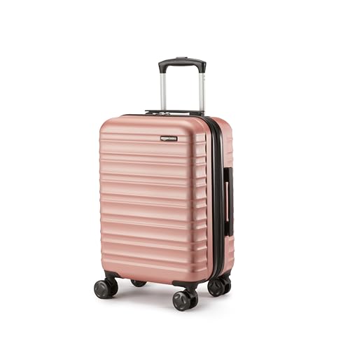 Detalle de Amazon Basics Hard Shell Small Suitcase (Rose Gold) – Expandable ABS Carry-On with 4 Double Spinner Wheels