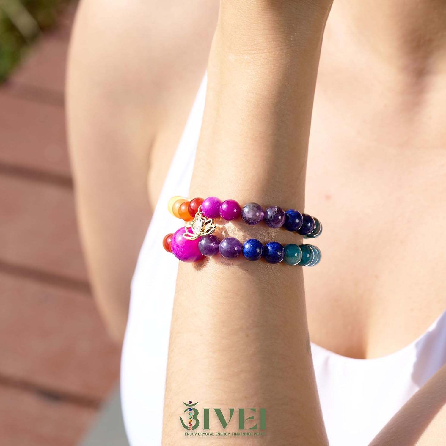 Detalle 2 de Bracciali Bivei in pietra naturale Cristallo verde con perline da 8 mm e charm loto (set)
