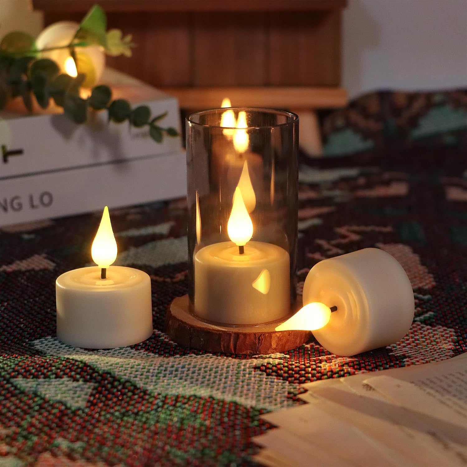 Detalle de Cibnew wiederaufladbare LED-Teelichter mit Timer & Fernbedienung (12 Stück, Beige)