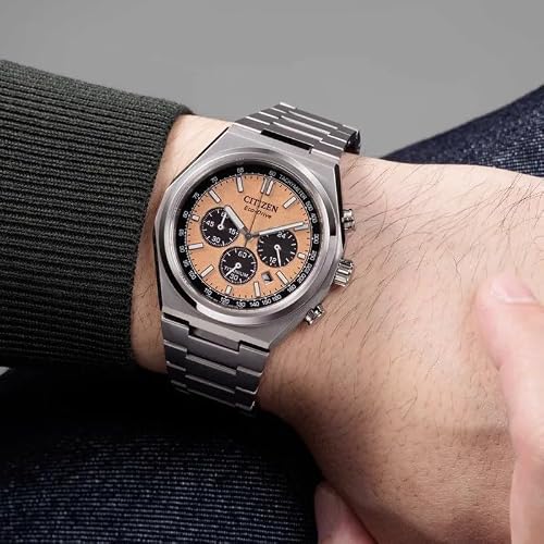 Detalle de Citizen Reloj CA4610-85Z Eco-Drive: cronógrafo de titanio con esfera naranja y taquímetro
