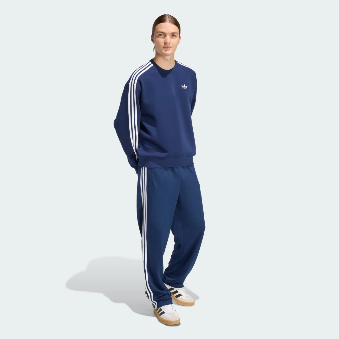 Detalle de Sudadera de cuello redondo holgada Adidas Adicolor 3 Stripes en azul