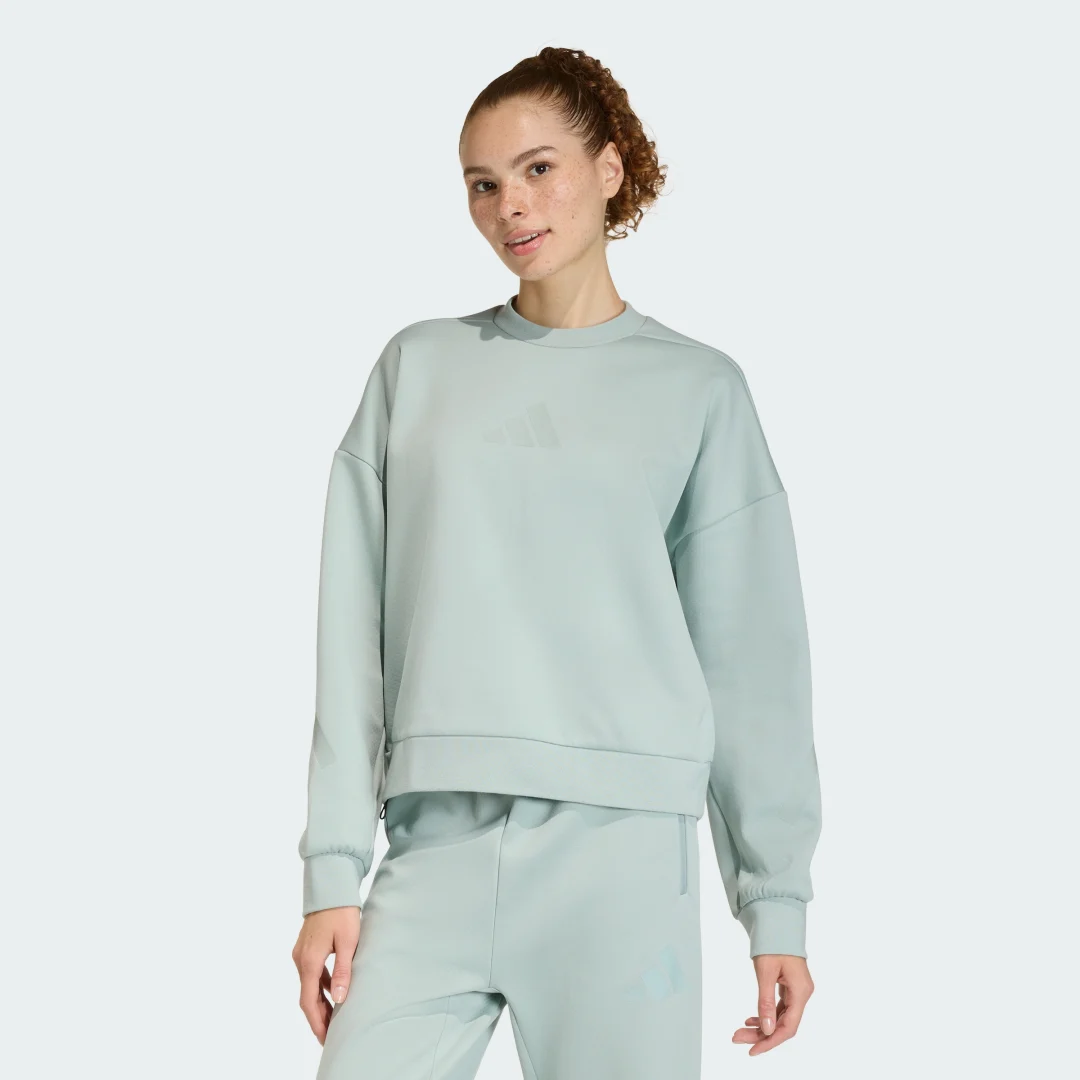 Detalle de SUDADERA ADIDAS Z.N.E. Verde — confort y estilo urbano de Adidas