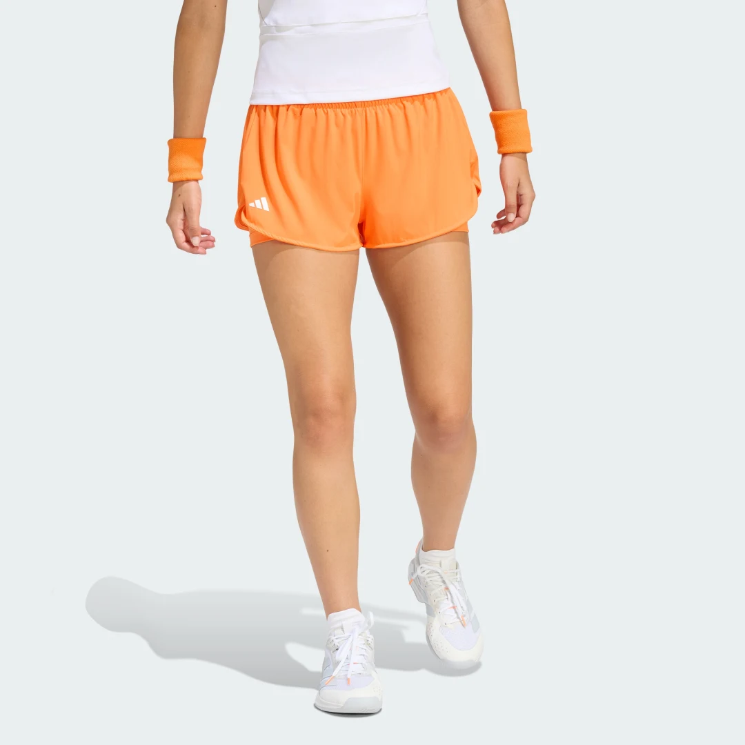 Detalle de Pantalón corto de tenis 2 en 1 Climacool Match de Adidas – naranja