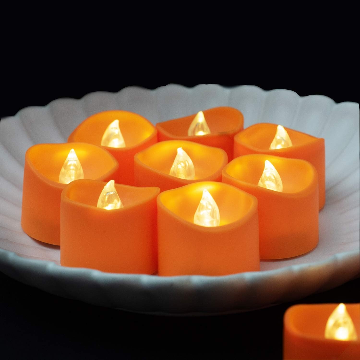Detalle 2 de Homemory Orange LED Tealight Candles, 12-Pack Flameless Flickering Lights