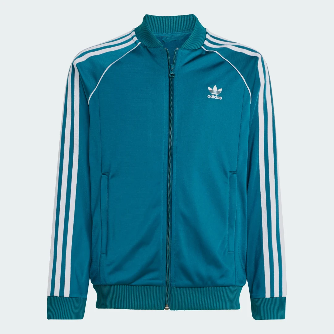 Detalle de Chaqueta SST Adicolor (Adolescentes) de Adidas – Turquesa para looks casual y cómodo