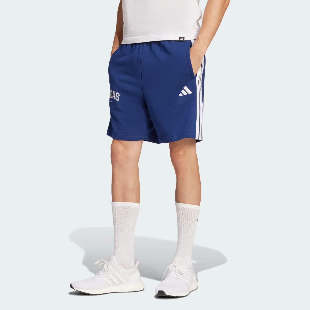 Detalle de Pantalón corto 3 bandas de Adidas — color azul, comodidad para entrenar y vestir