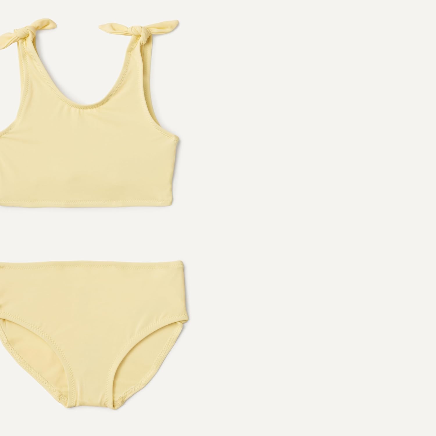 Detalle de Amazon Essentials Maillot de bain bikini 2 pièces avec nœud pour fille : coupe ajustée et tissu à séchage rapide