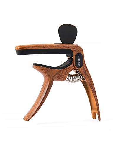 Detalle de Linrax C1 Cejilla Guitarra 3 en 1 con Soporte para Púas y Extractor de Puentes
