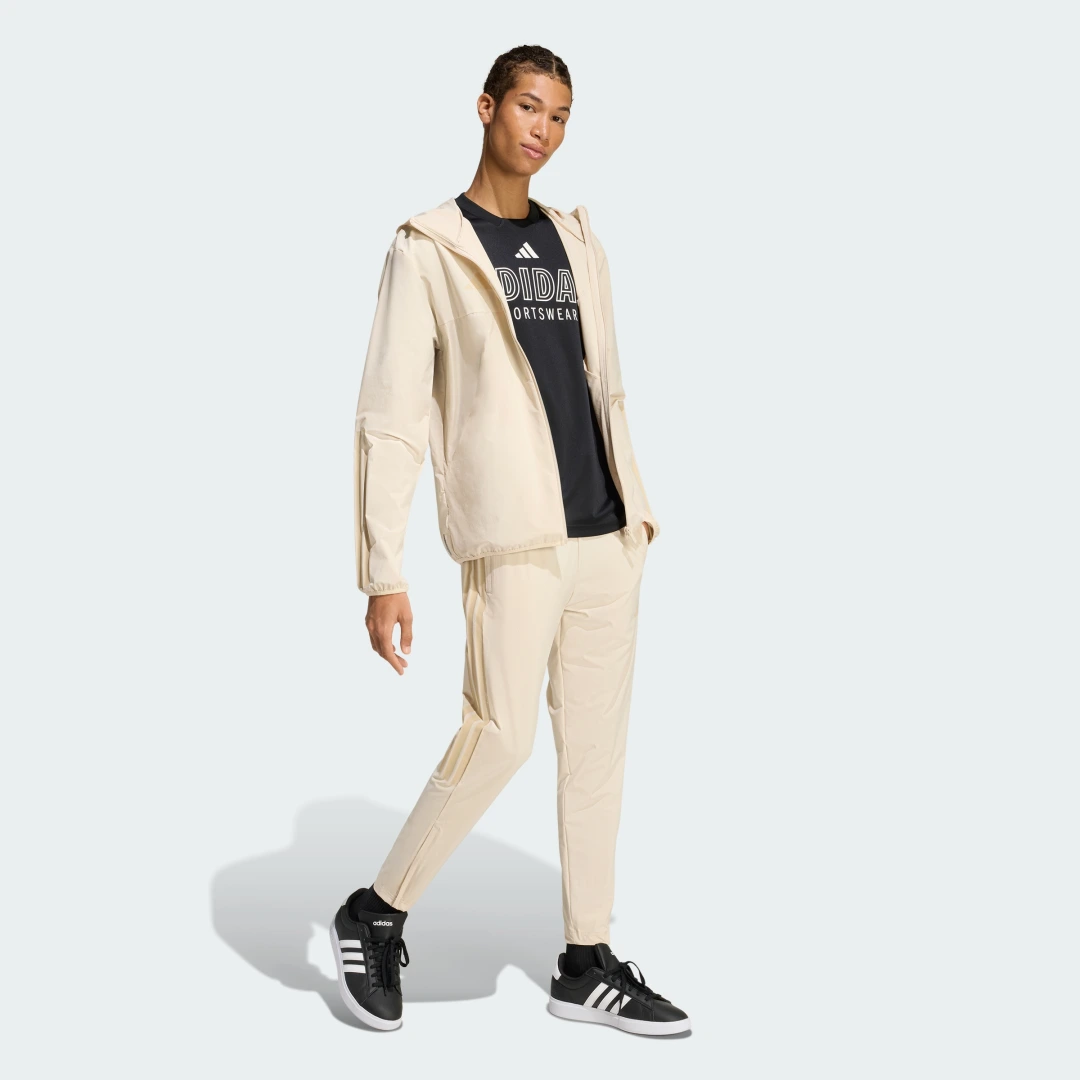 Detalle de Pantalón House of TIRO de Adidas: cómodo y práctico para el día a día