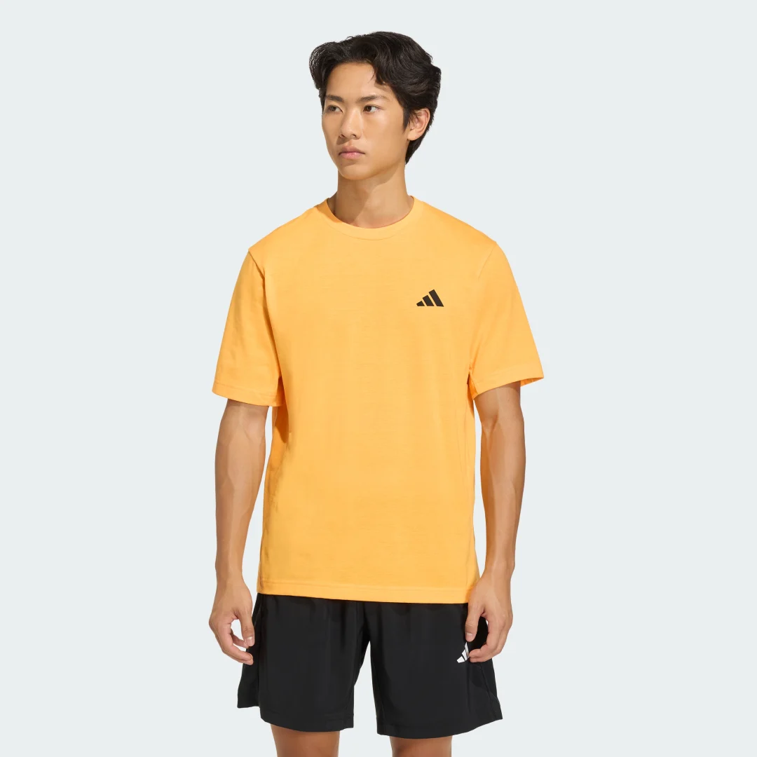 Detalle de Camiseta de Entrenamiento Essentials FeelReady de Adidas – naranja