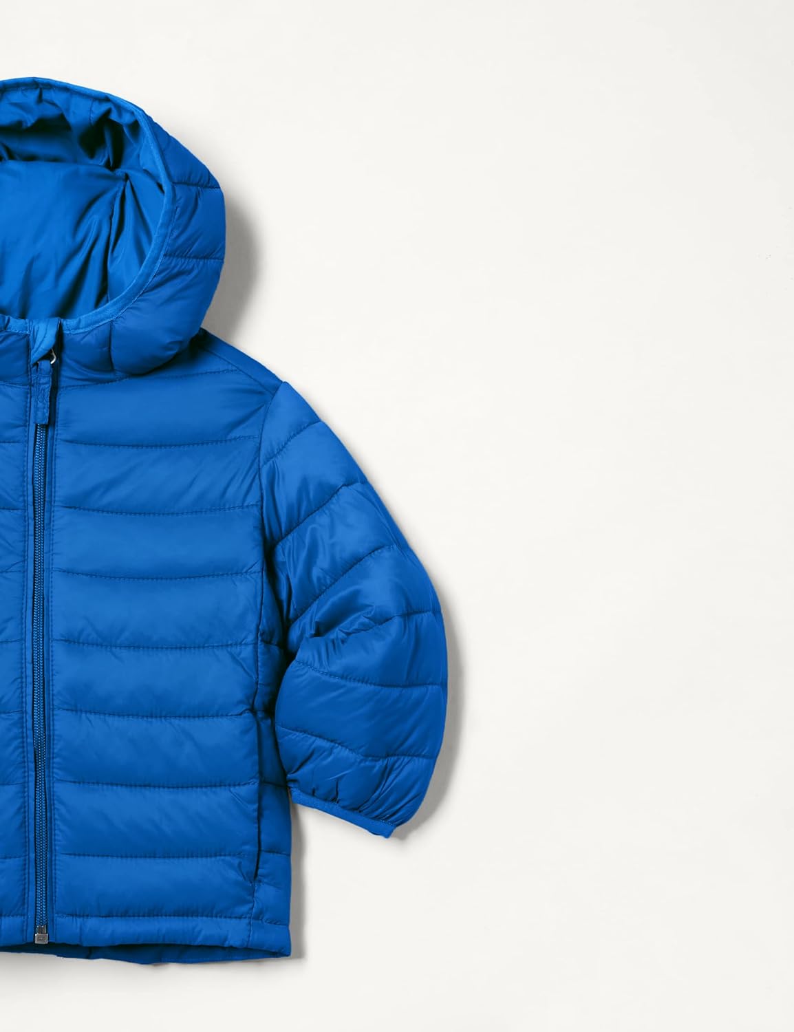 Detalle 2 de Amazon Essentials Jungen Leichte wasserdichte verstaubare Übergangsjacke mit Kapuze