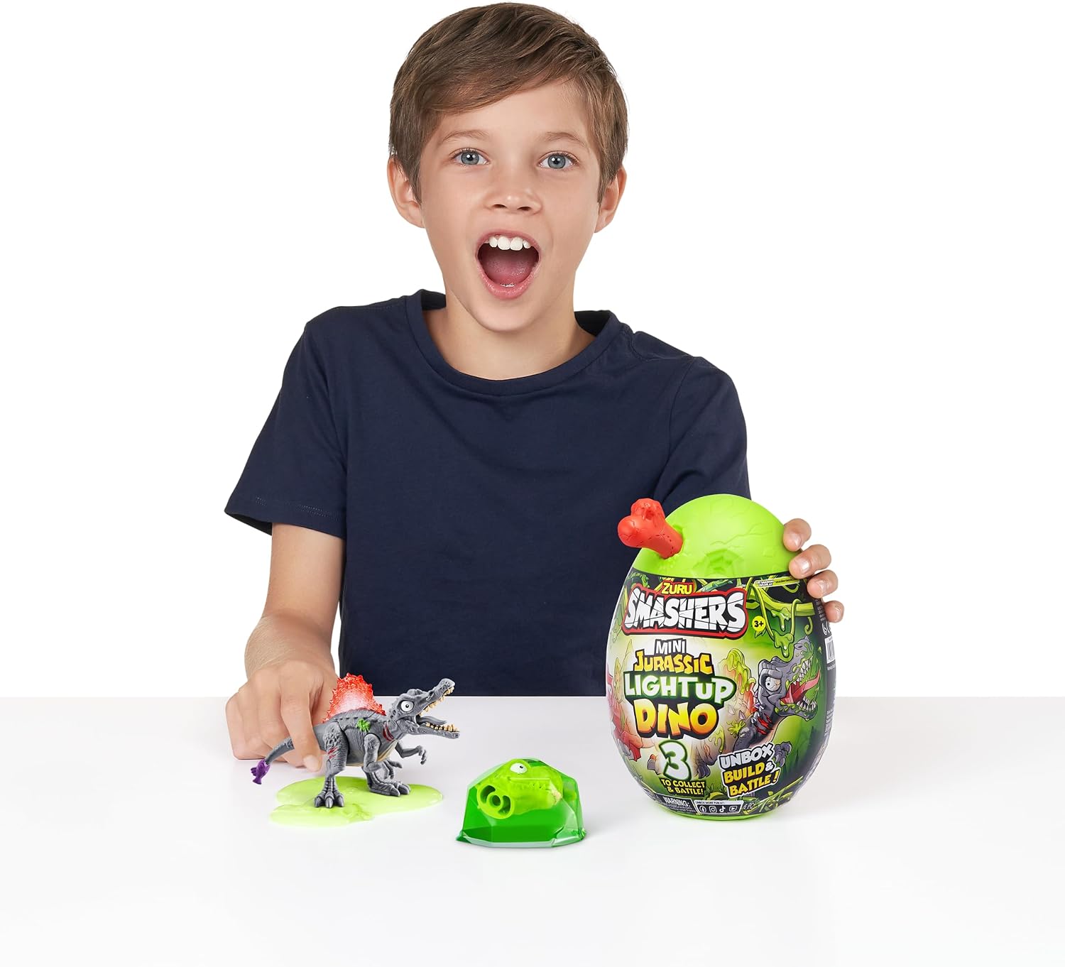 Detalle de Smashers Mini Jurassic Light-Up Dino Egg Spinosaurus Toy with Surprises