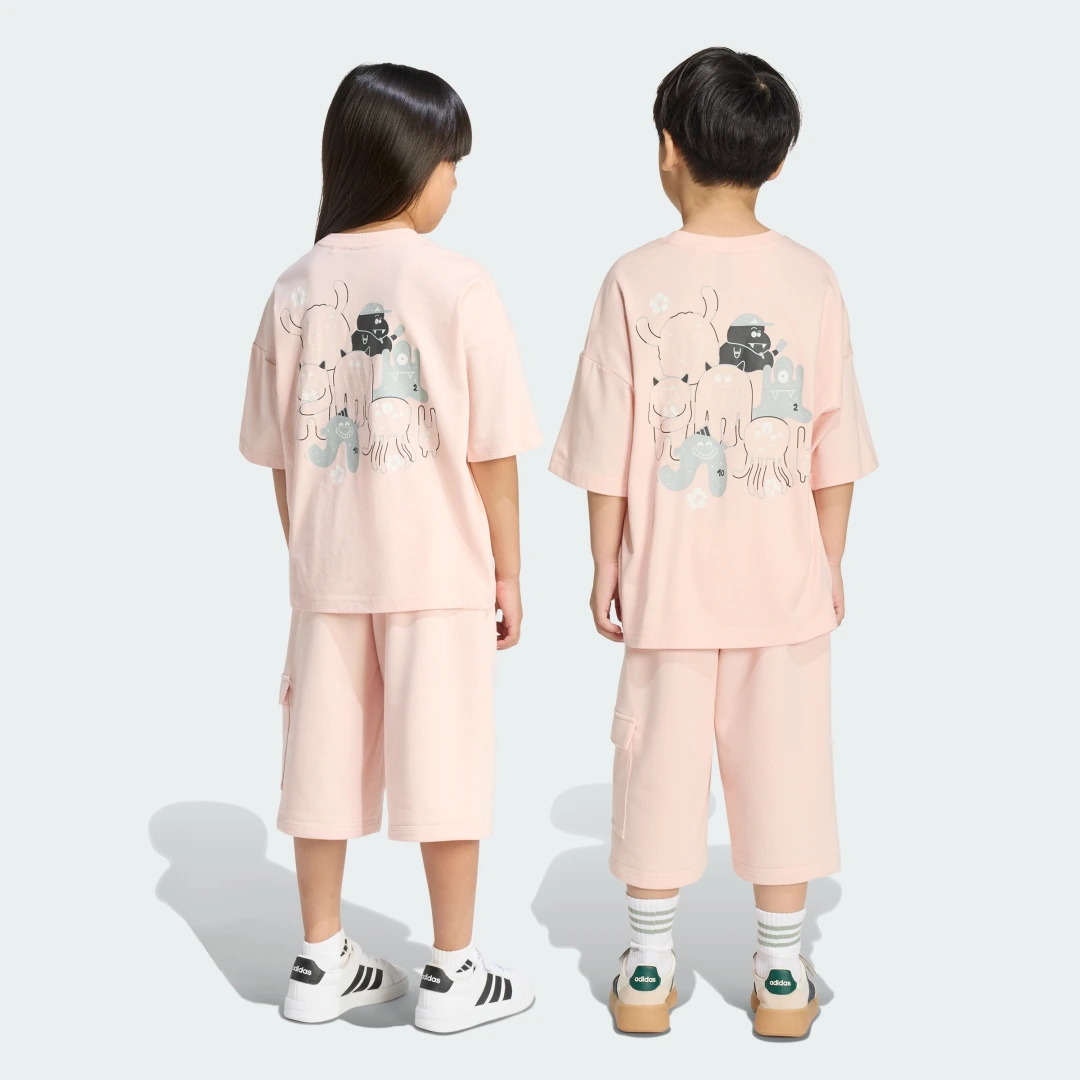 Detalle 2 de Conjunto con camiseta TIRO_NSTER de Adidas — rosa, cómodo y práctico para entrenos