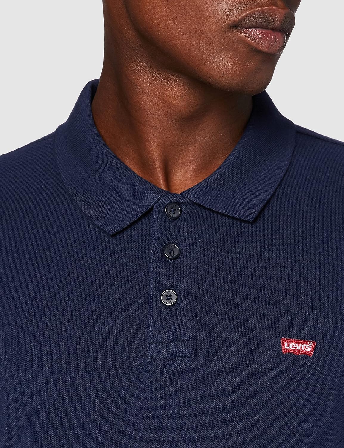 Detalle de Levi's Housemark Polo Chemise Homme — polo élégant et polyvalent