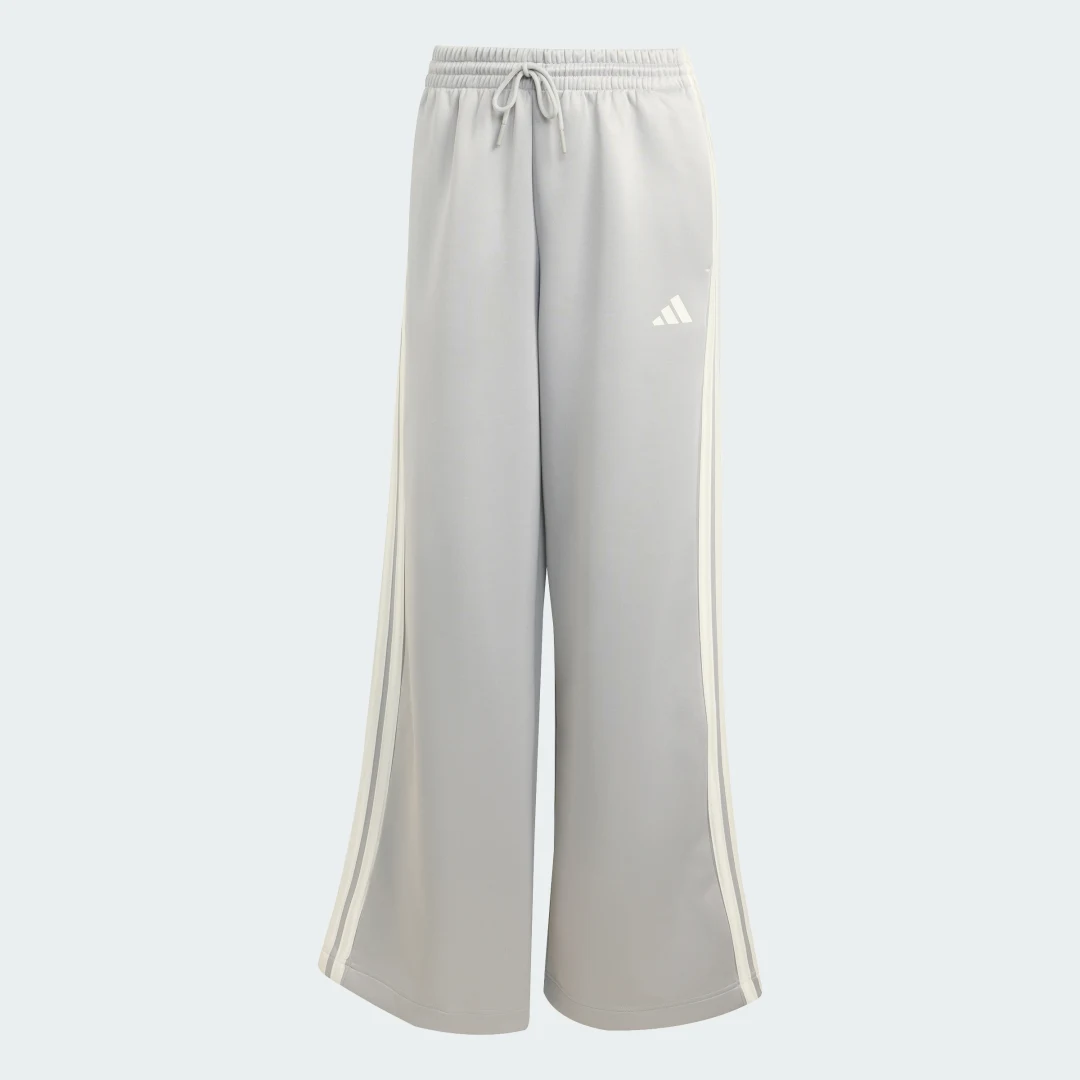 Detalle de Pantalón Stadium 3 bandas de Adidas: estilo y comodidad en gris