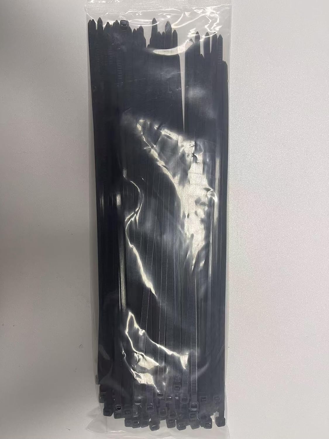 Detalle de ATETEO Schwarze Kabelbinder 300 mm x 4,8 mm – 100 Stück, Premium-Nylon, Selbstsperrmechanismus