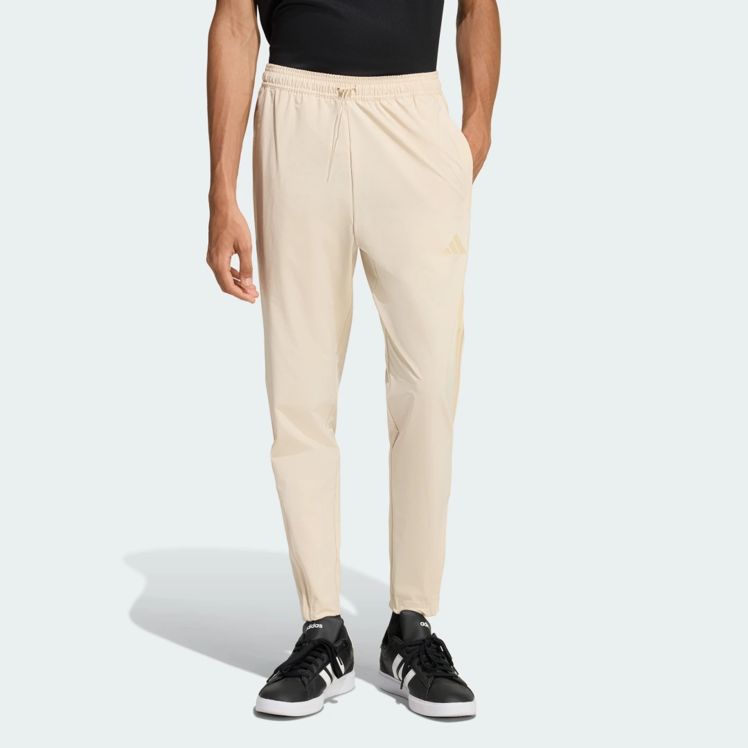 Detalle de Pantalón House of TIRO de Adidas: cómodo y práctico para el día a día