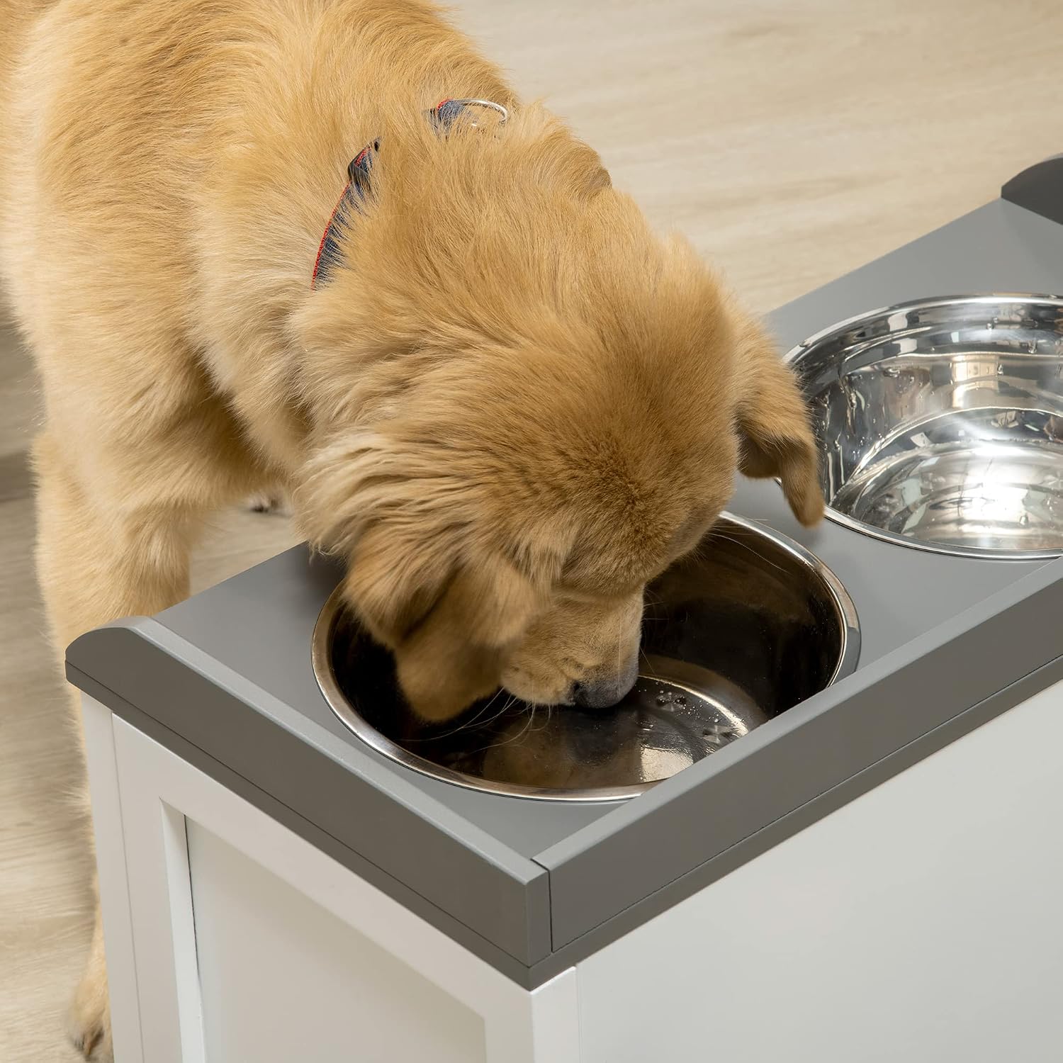 Detalle de PawHut gamelles pour chiens surélevées avec support et tiroir coulissant (2 gamelles inox de 2 L)