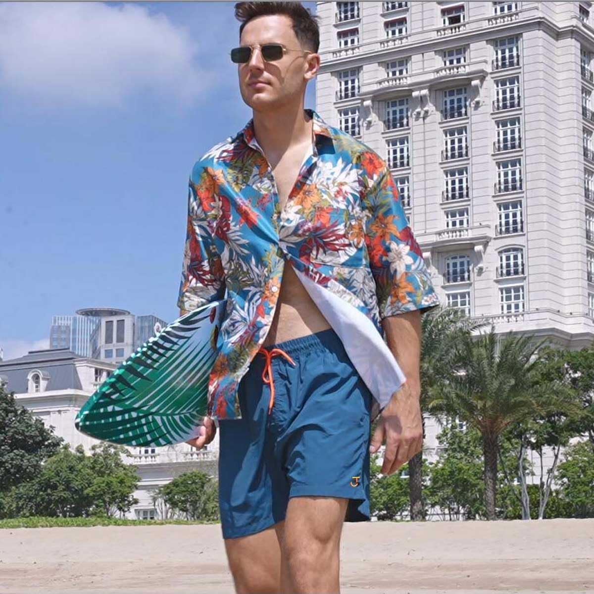 Detalle de JustSun badshorts för män med nätfoder, snabbtorkande tyg och dragkedjefickor
