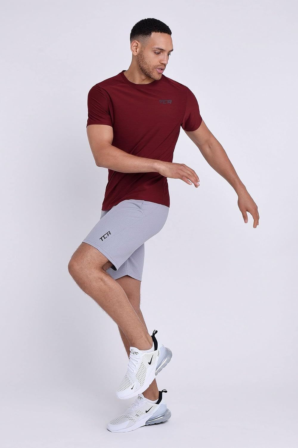 Detalle de TCA Galaxy Maglietta Palestra Uomo: maglia running a maniche corte, stile spacedye e tecnologia D.R.Y.