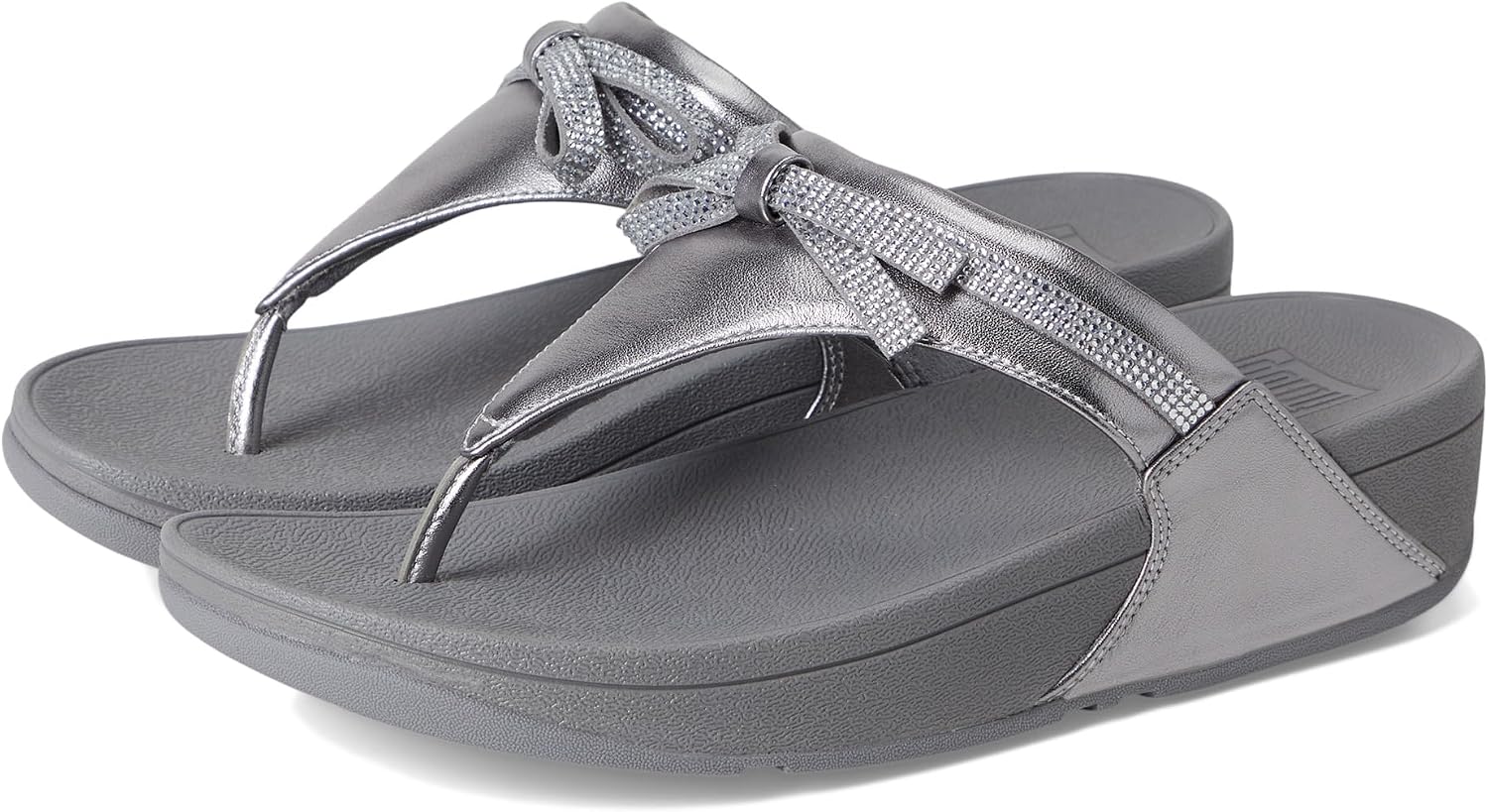 Detalle de Fitflop Lulu Glitz-bow Leather Toe-post Sandals: confort et soutien pour un usage quotidien