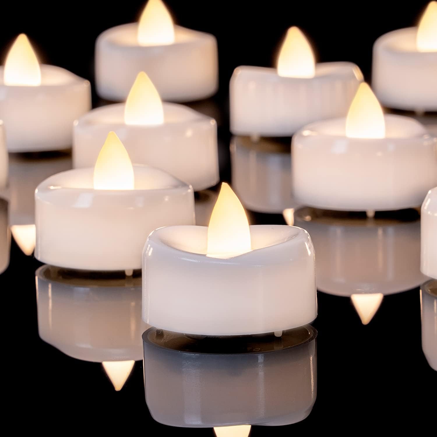 Detalle de AMAGIC 12 Stück Flackernden Kerzen mit Timer – LED-Teelichter mit 6-Stunden-Timer, warmweiß