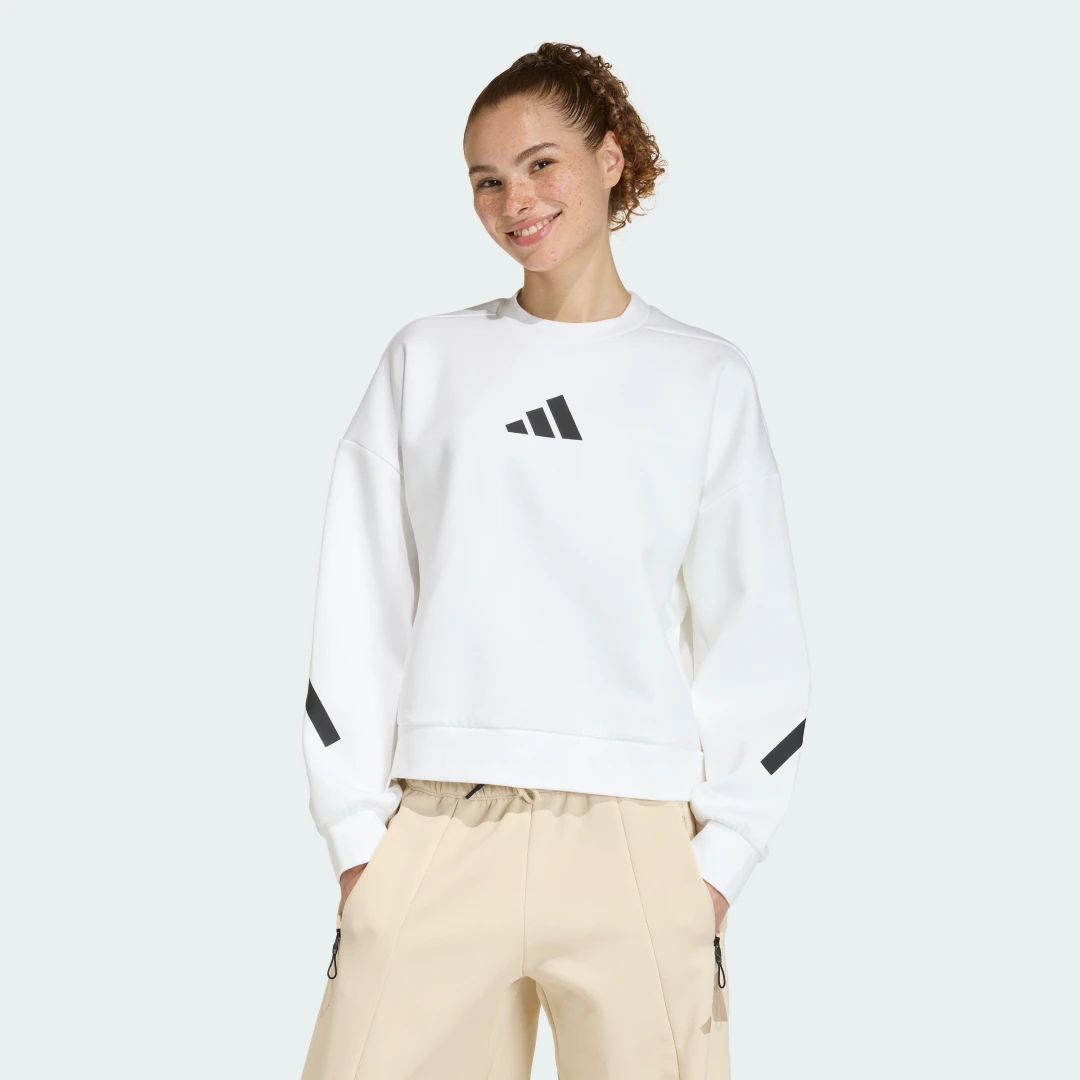 Detalle de Sudadera Adidas Z.N.E. en blanco – comodidad y carácter para tu día a día